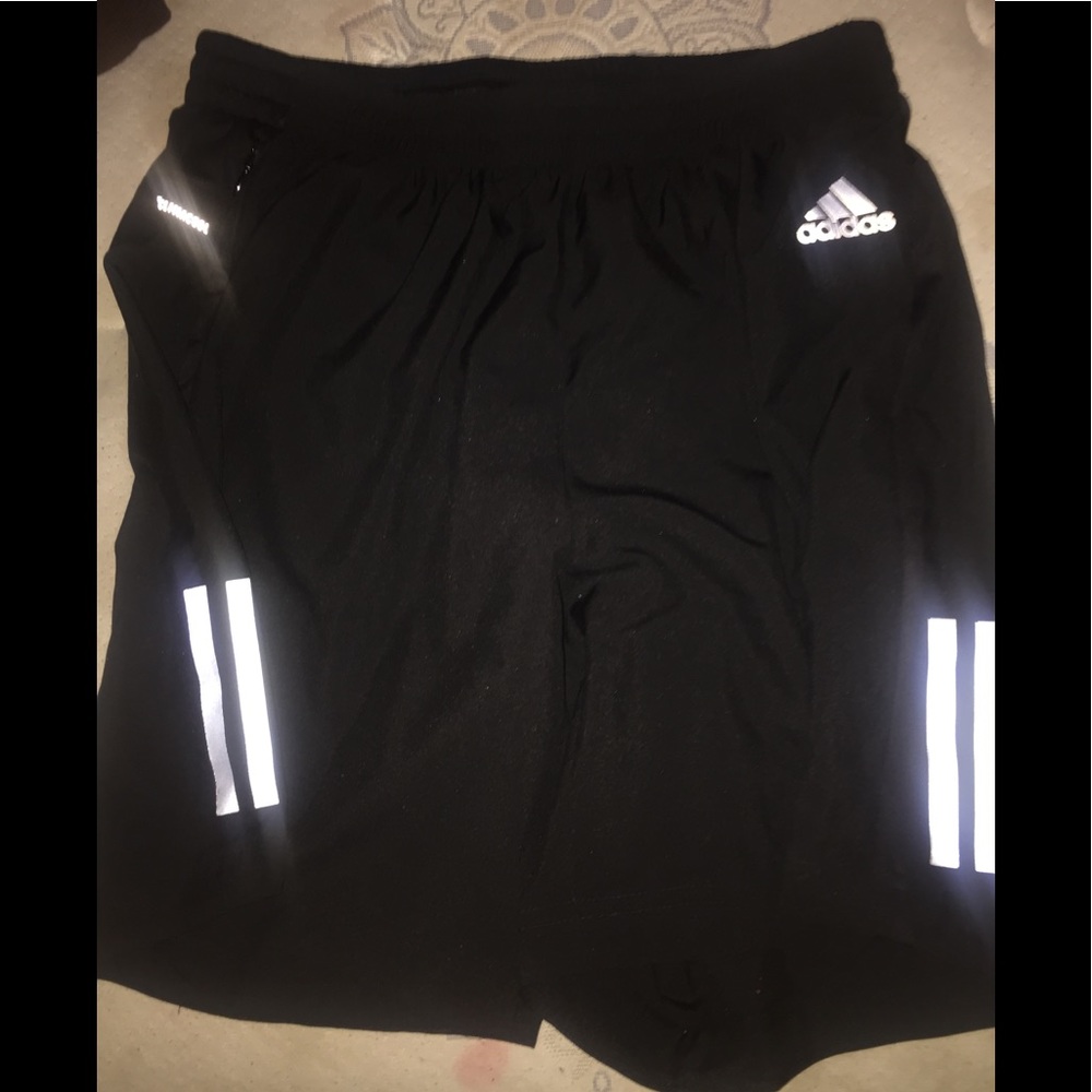 Adidas black and white running shorts.